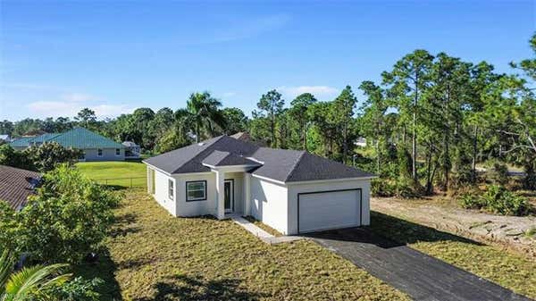 506 TRINITY ST E, LEHIGH ACRES, FL 33974 - Image 1