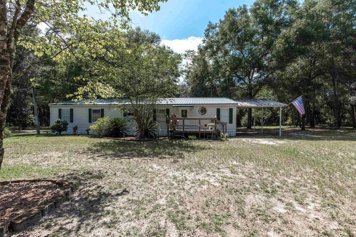 299 HUNTINGTON SHORTCUT RD, CRESCENT CITY, FL 32112, photo 1 of 64