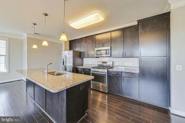 13722 NEIL ARMSTRONG AVE APT 502, HERNDON, VA 20171 - Image 1