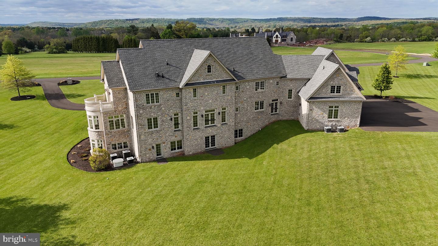 Perched at the pinnacle of an exclusive Upper Makefield Township encla – image 123