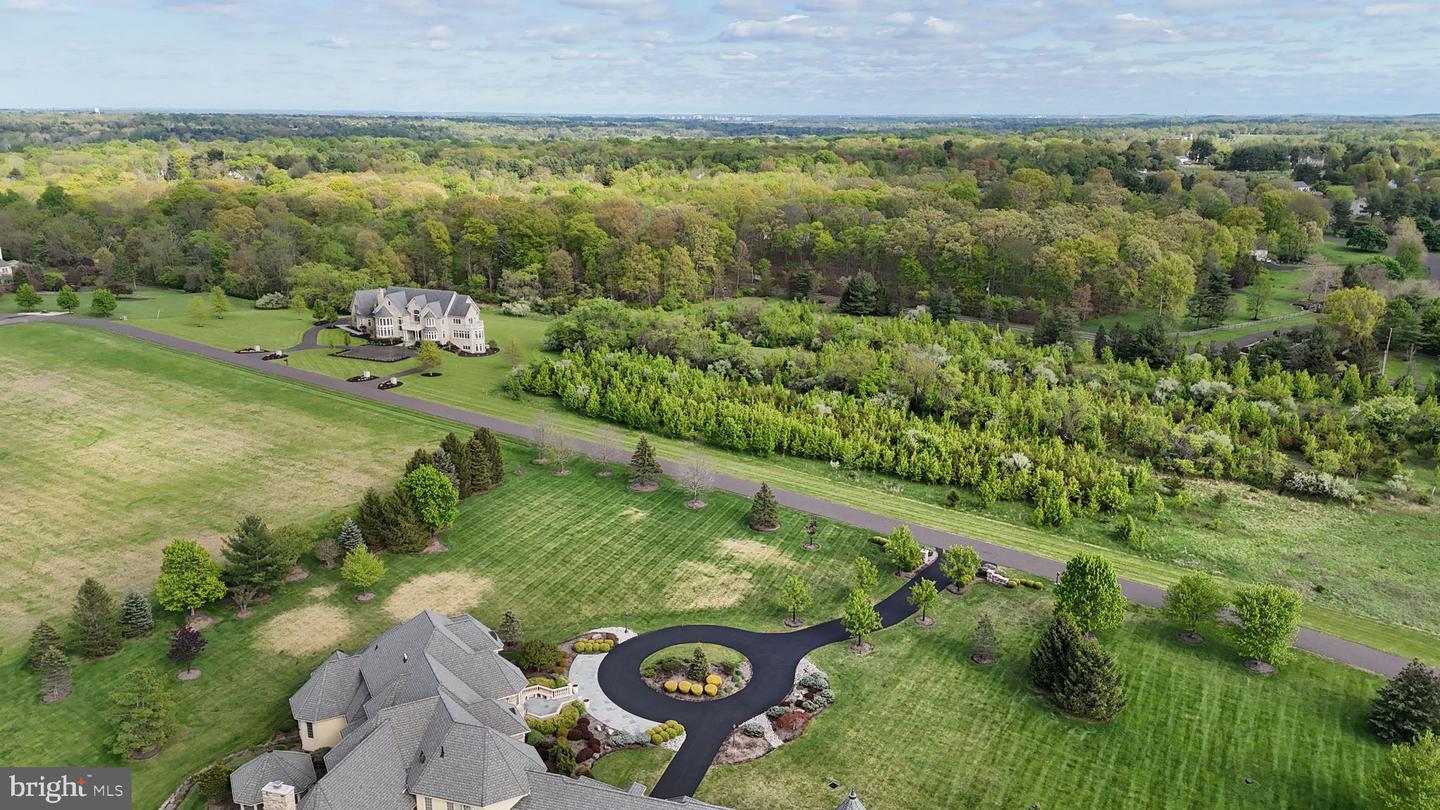 Perched at the pinnacle of an exclusive Upper Makefield Township encla – image 116