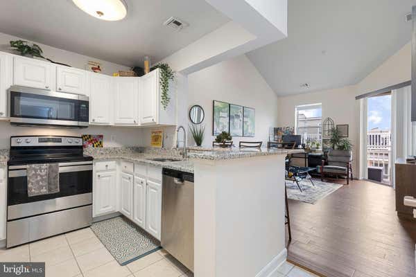 23 PIERSIDE DR APT 408, BALTIMORE, MD 21230 - Image 1