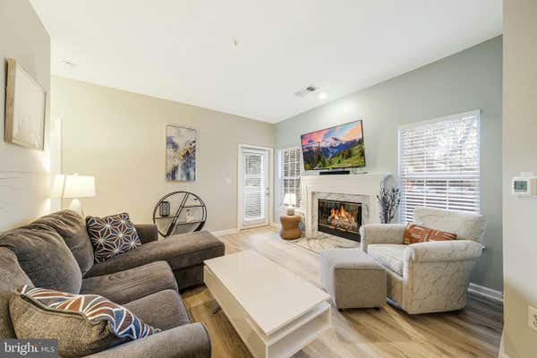 1712 LAKE SHORE CREST DR APT 12, RESTON, VA 20190 - Image 1