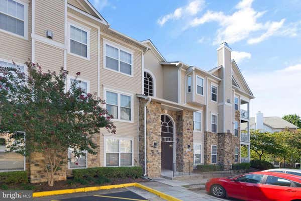 5921 FOUNDERS CROSSING CT UNIT 302, ALEXANDRIA, VA 22310 - Image 1