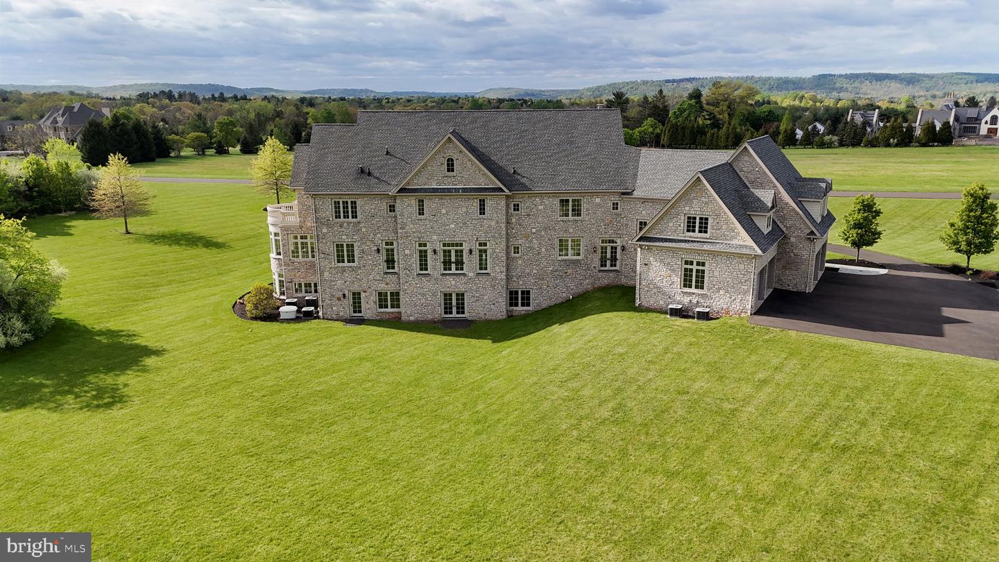Perched at the pinnacle of an exclusive Upper Makefield Township encla – image 124