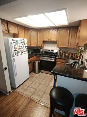 15511 SHERMAN WAY APT 24, VAN NUYS, CA 91406 - Image 1