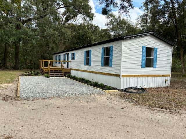 7951 NW 48TH TER, CHIEFLAND, FL 32626, photo 1 of 31