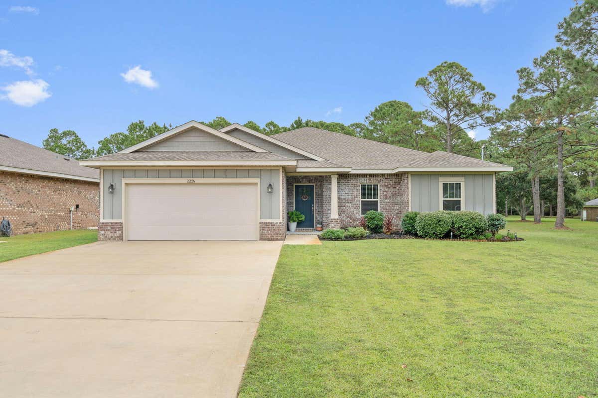 2226 PANHANDLE TRL, NAVARRE, FL 32566, photo 1 of 50