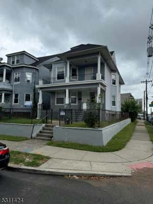 109 ROSA PARKS BLVD APT 2-111, PATERSON, NJ 07501 - Image 1