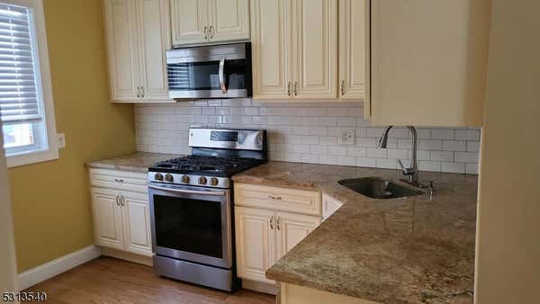 239 GRANT AVE, JERSEY CITY, NJ 07305 - Image 1