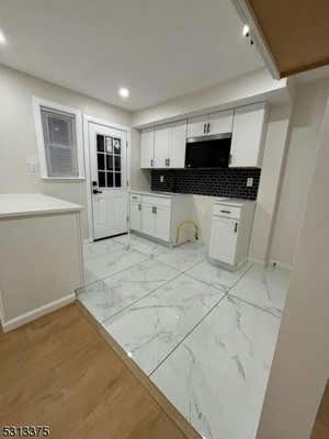 27A MELMORE GDNS, EAST ORANGE, NJ 07017 - Image 1