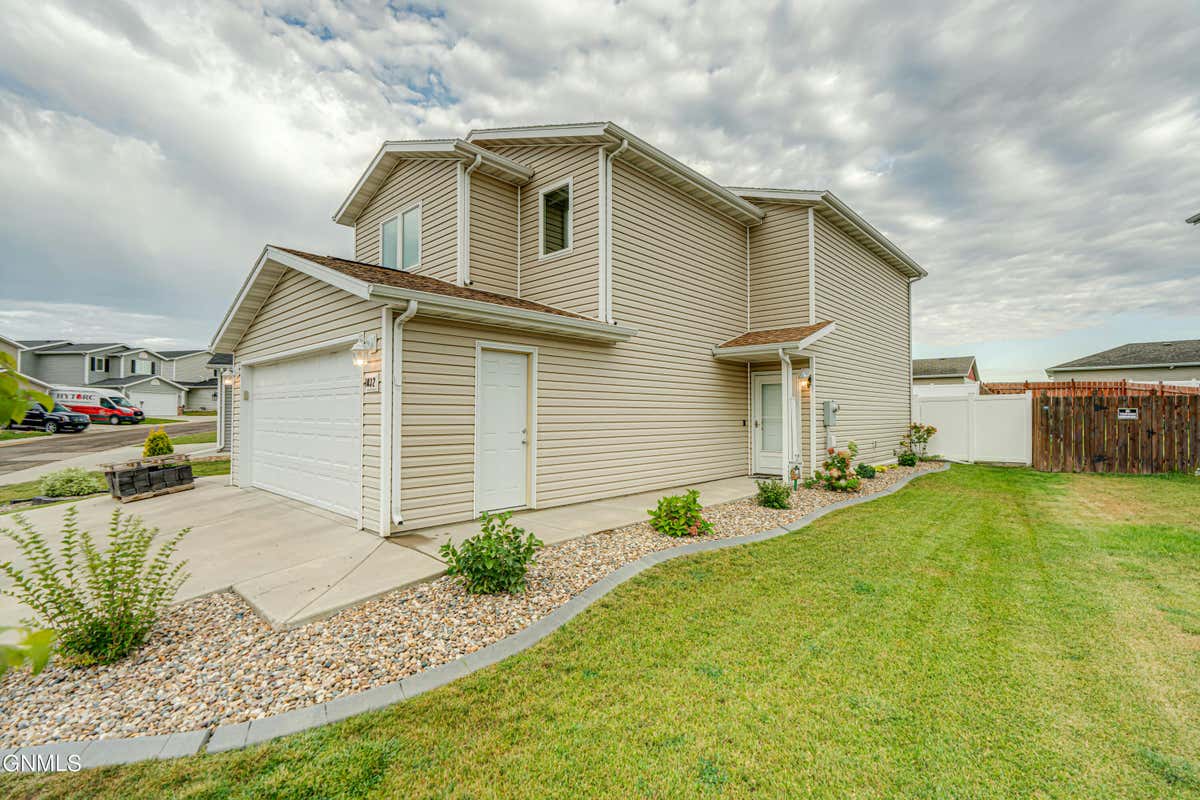 1032 MADISON LN, BISMARCK, ND 58503, photo 1 of 55