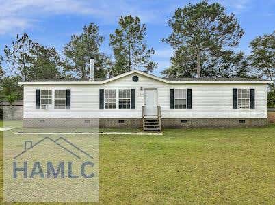 110 WILLOW LN NE, LUDOWICI, GA 31316 - Image 1