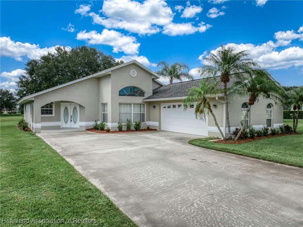 8 MEADOWLAKE CIR N, LAKE PLACID, FL 33852, photo 1 of 43