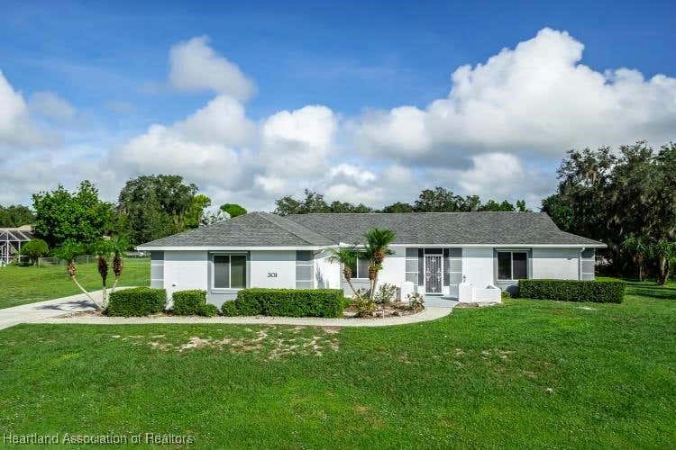 301 ROBINHOOD TER, SEBRING, FL 33876, photo 1 of 49