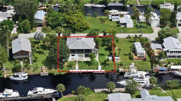 1102 DOLPHIN LN, MOORE HAVEN, FL 33471 - Image 1