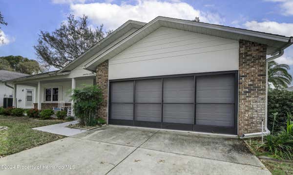 6460 PINE MEADOWS DR, SPRING HILL, FL 34606, photo 4 of 49