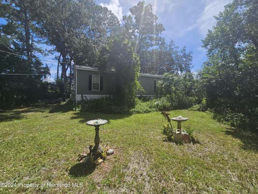 1075 S PALM AVE, HOMOSASSA, FL 34448 - Image 1