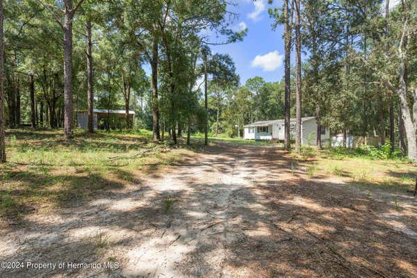 6421 SUNNYSIDE RANCH RD, BROOKSVILLE, FL 34602, photo 3 of 37