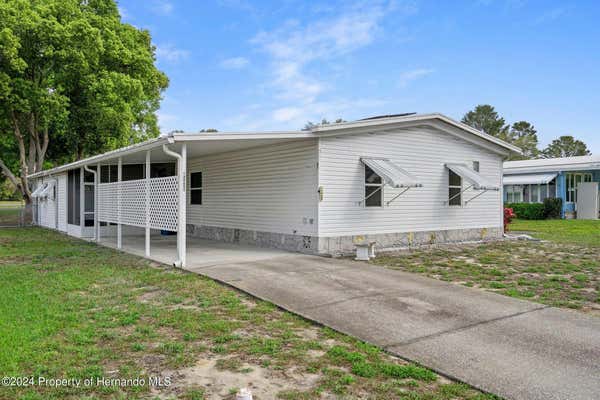 15439 BROOKRIDGE BLVD, BROOKSVILLE, FL 34613, photo 2 of 39