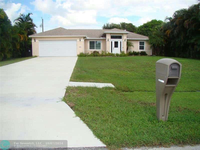 537 SW DAUPHIN AVE, PORT ST LUCIE, FL 34953, photo 1 of 44