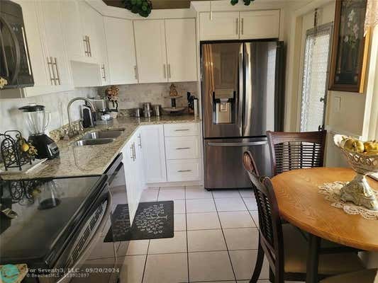 3940 NW 42ND AVE APT 417, LAUDERDALE LAKES, FL 33319 - Image 1