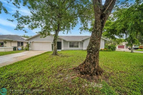 4825 NW 50TH ST, COCONUT CREEK, FL 33073, photo 2 of 37