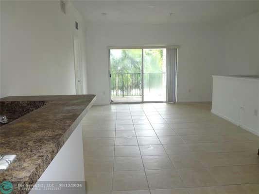 5860 W SAMPLE RD APT 307, CORAL SPRINGS, FL 33067 - Image 1