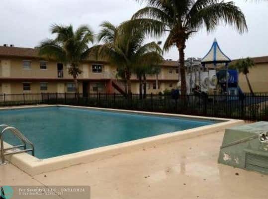 101 NE 41ST ST APT F101, OAKLAND PARK, FL 33334 - Image 1