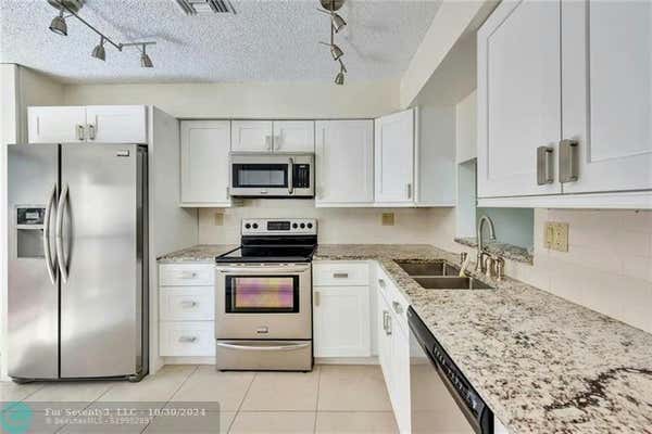 5201 NE 14TH TER APT 1, FORT LAUDERDALE, FL 33334 - Image 1