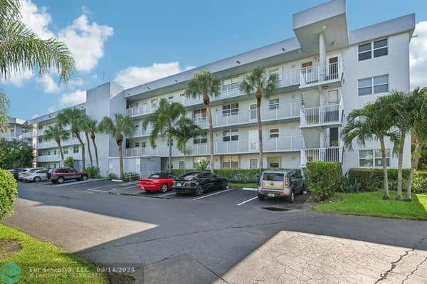 102 ROYAL PARK DR APT 1A, OAKLAND PARK, FL 33309 - Image 1