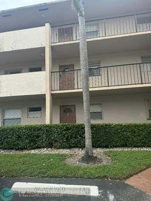 8311 SANDS POINT BLVD APT 105, TAMARAC, FL 33321 - Image 1