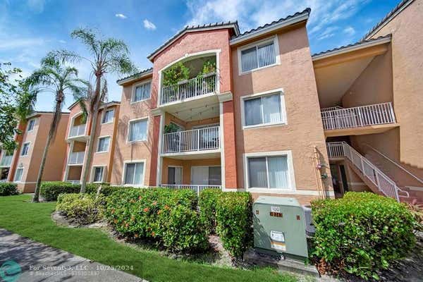 3854 LYONS RD APT 208, COCONUT CREEK, FL 33073 - Image 1