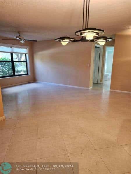 3277 COCOPLUM CIR # 3327, COCONUT CREEK, FL 33063, photo 1 of 34