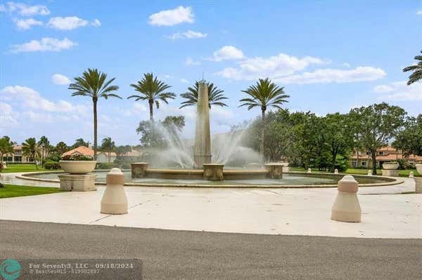 5060 HARMONY CIR APT 104, VERO BEACH, FL 32967 - Image 1