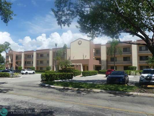 10657 W CLAIRMONT CIR # 306, TAMARAC, FL 33321 - Image 1