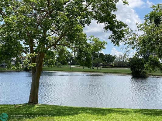 9500 N HOLLYBROOK LAKE DR APT 103, PEMBROKE PINES, FL 33025 - Image 1