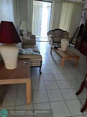 2850 SOMERSET DR APT 402L, LAUDERDALE LAKES, FL 33311 - Image 1