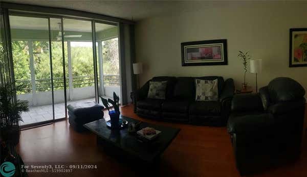 8351 SANDS POINT BLVD APT A210, FORT LAUDERDALE, FL 33321, photo 4 of 8