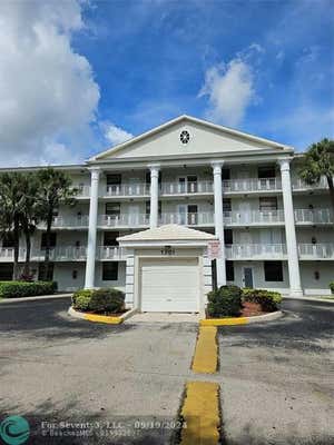 1701 WHITEHALL DR APT 303, DAVIE, FL 33324 - Image 1