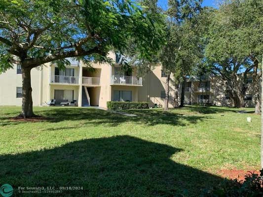 431 EXECUTIVE CENTER DR APT 107, WEST PALM BEACH, FL 33401 - Image 1