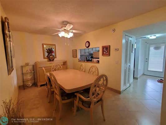 6075 N SABAL PALM BLVD APT 307, TAMARAC, FL 33319 - Image 1