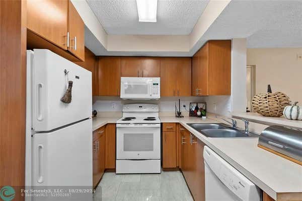 5530 NW 61ST ST APT 308, COCONUT CREEK, FL 33073 - Image 1