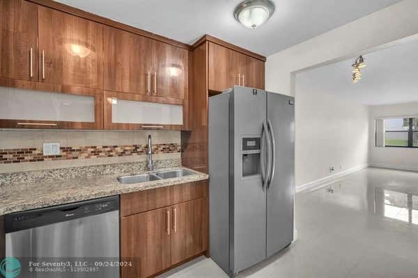 303 RACQUET CLUB RD APT 112, WESTON, FL 33326 - Image 1