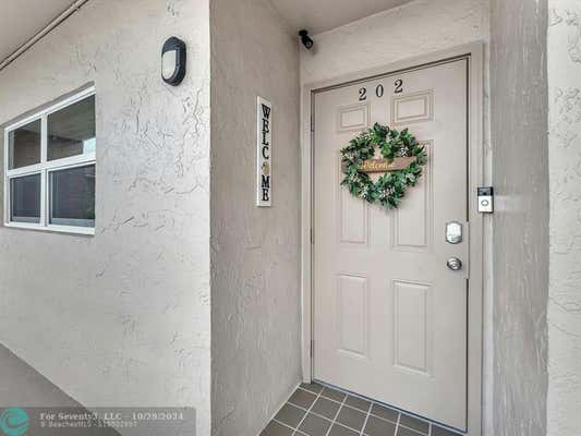 8822 W MCNAB RD APT 202, TAMARAC, FL 33321 - Image 1