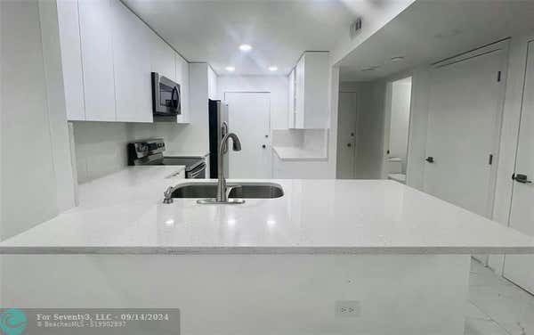 5555 COLLINS AVE APT 14C, MIAMI BEACH, FL 33140 - Image 1