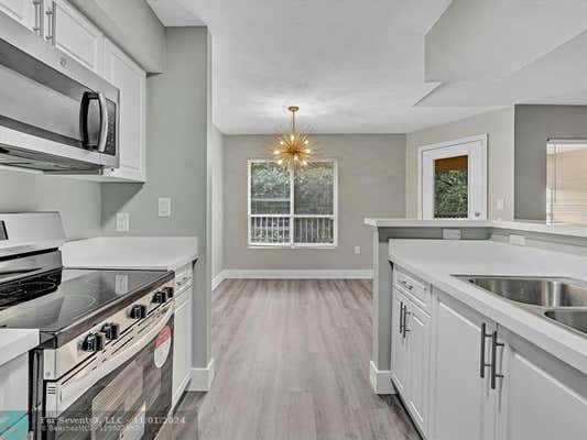 2465 NW 33RD ST APT 1513, OAKLAND PARK, FL 33309 - Image 1