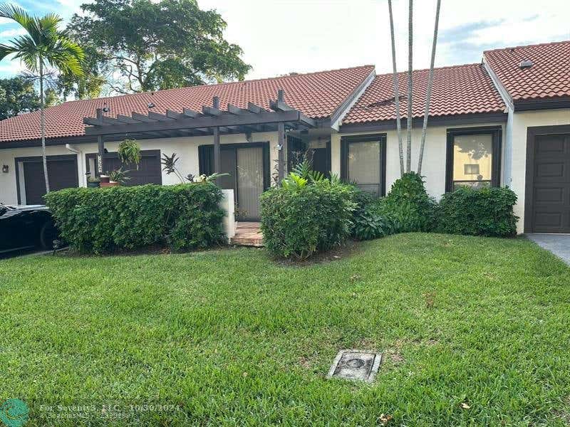 7227 SOLANDRA LN, TAMARAC, FL 33321, photo 1 of 21