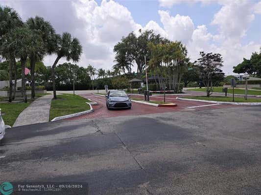 1100 COLONY POINT CIR APT 214, PEMBROKE PINES, FL 33026, photo 2 of 45