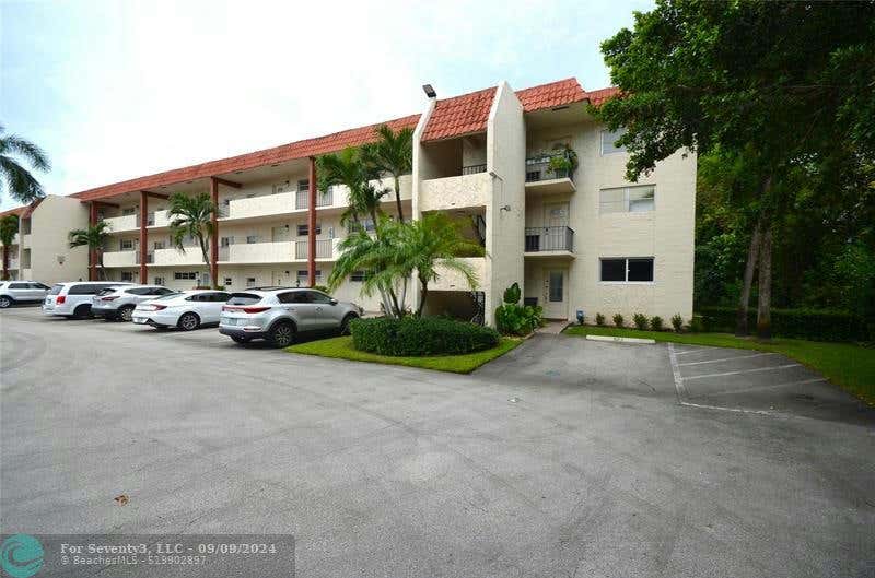 8901 S HOLLYBROOK BLVD APT 101, PEMBROKE PINES, FL 33025, photo 1 of 35